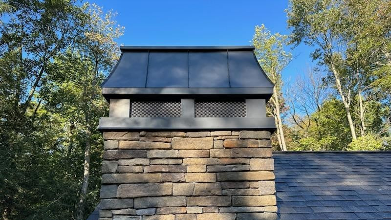 Custom chimney cap installed on stone masonry chimney — Archaic Metal fabricated, Berlin NJ