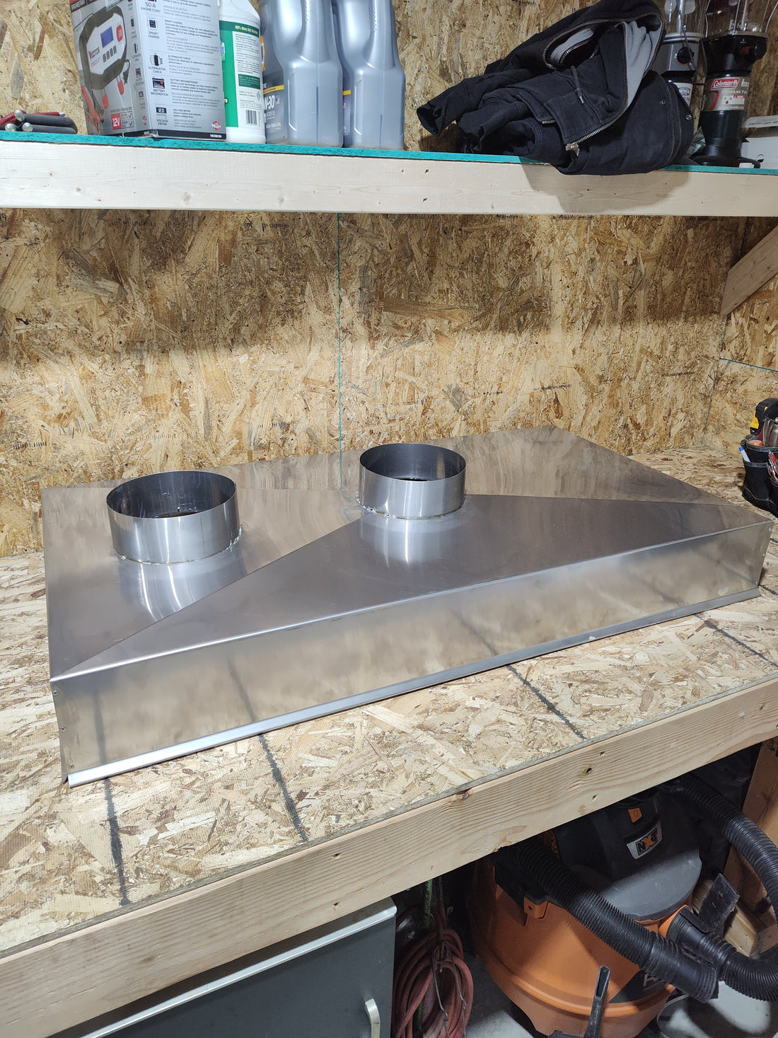 Custom stainless steel chimney chase cover with soldered flue collars — hand-fabricated at Archaic Metal shop in Berlin, NJ