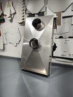 stainless steel chimney chase top cover with 2 3" collars soldered on a workbench in berlin nj archaic metal 