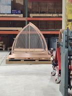 Custom arched cathedral chimney cap in 16oz copper — full profile view showing convex pointed arch form and stainless steel spark screen, fabricated by Archaic Metal in Berlin, NJ