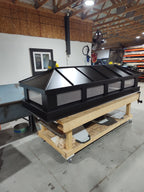 Large black kynar chimney hip cap on work bench in nj shop archaic metal 