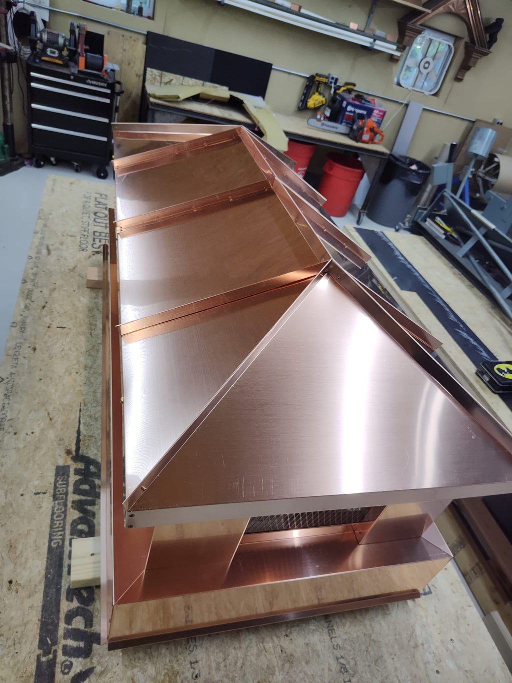 Standing seam copper sheet detail — Archaic Metal chimney cap fabrication process

