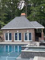 Custom copper chimney shroud installed on pool house brick chimney, Archaic Metal hand-fabricated architectural metalwork