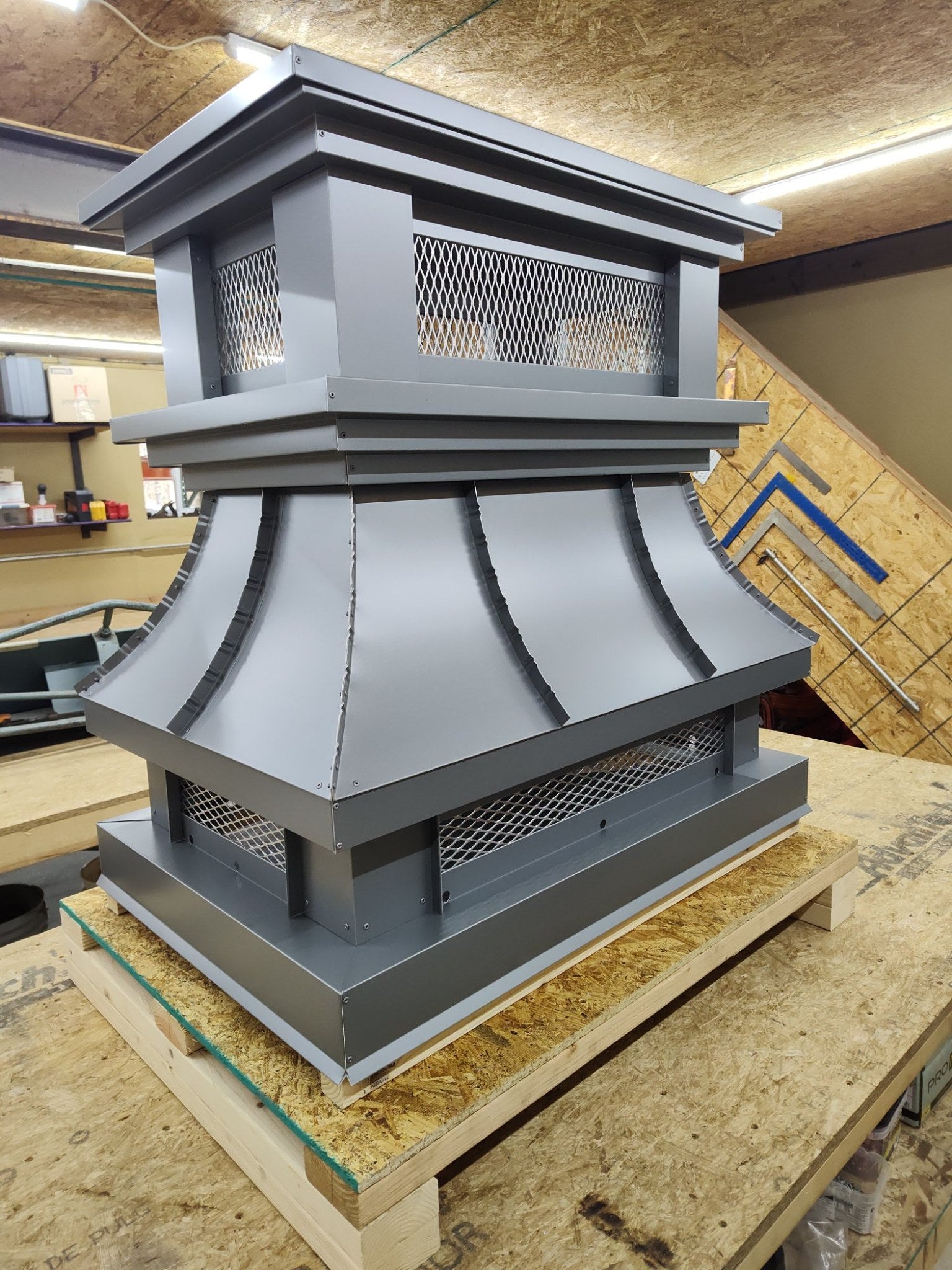 Custom Kynar gray crown top vent chimney cap, three-quarter view showing full profile