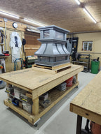 Kynar gray crown top vent cap showing curved panel body and riveted seam detail