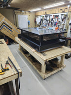 Large custom multi-flue chimney cap in black Kynar aluminum — shop view showing full scale, Berlin NJ
