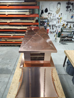 Copper top vent curved panel cap, top-down view showing pyramid crown and expanded metal screen