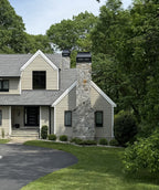 Black Kynar aluminum chimney cap installed on stone chimney — custom fabricated by Archaic Metal, Berlin NJ
