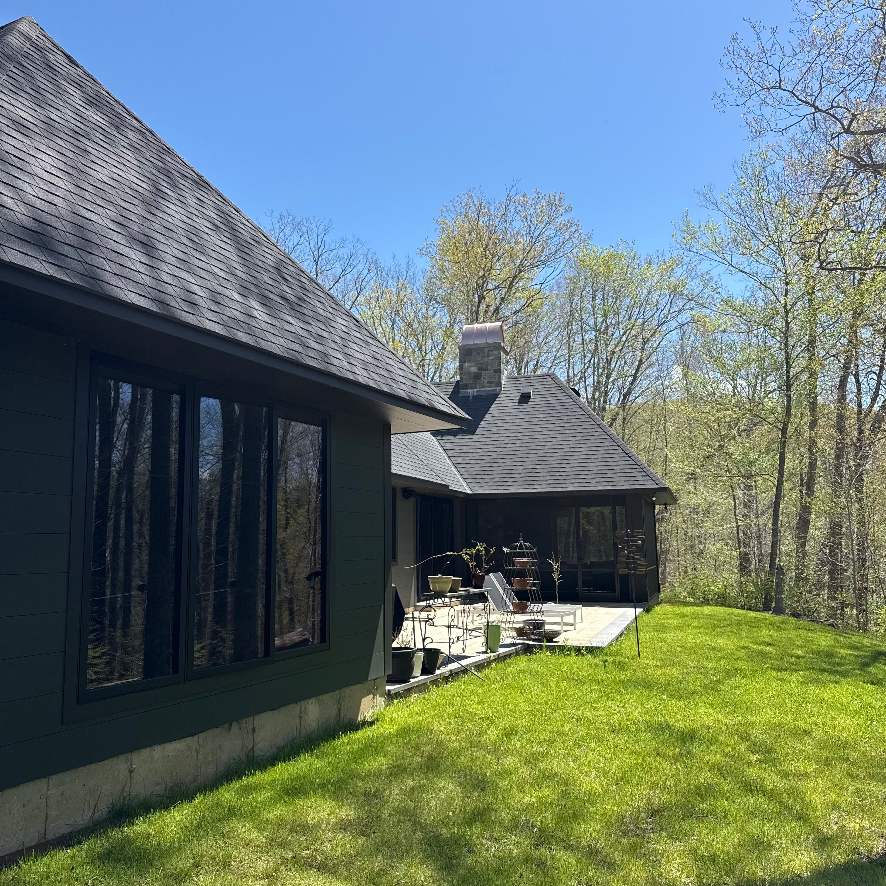 Custom copper chimney cap on stone chimney, modern residential home Connecticut