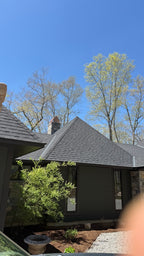 Custom copper arched cathedral chimney cap installed on stone chimney, Connecticut