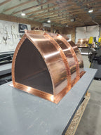 Hand-fabricated copper cathedral chimney cap in progress, custom top mount