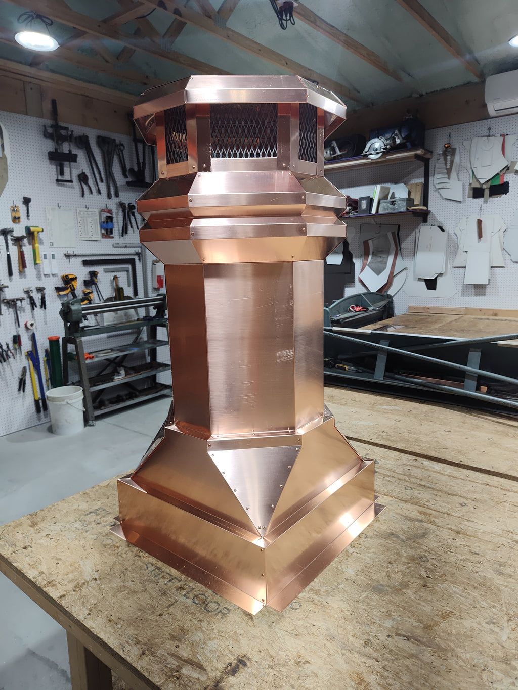 Custom copper Top Vent chimney cap on the workbench at Archaic Metal — Berlin, NJ