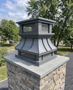 Custom crown top vent chimney flue cover in Kynar charcoal aluminum installed on stone masonry chimney — top mount, hand-fabricated in Berlin NJ