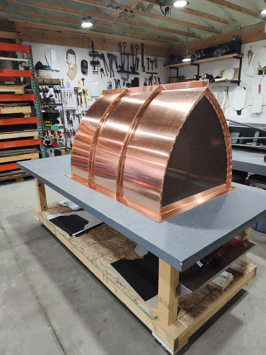 Custom copper top mount arched cathedral chimney cap, hand-fabricated