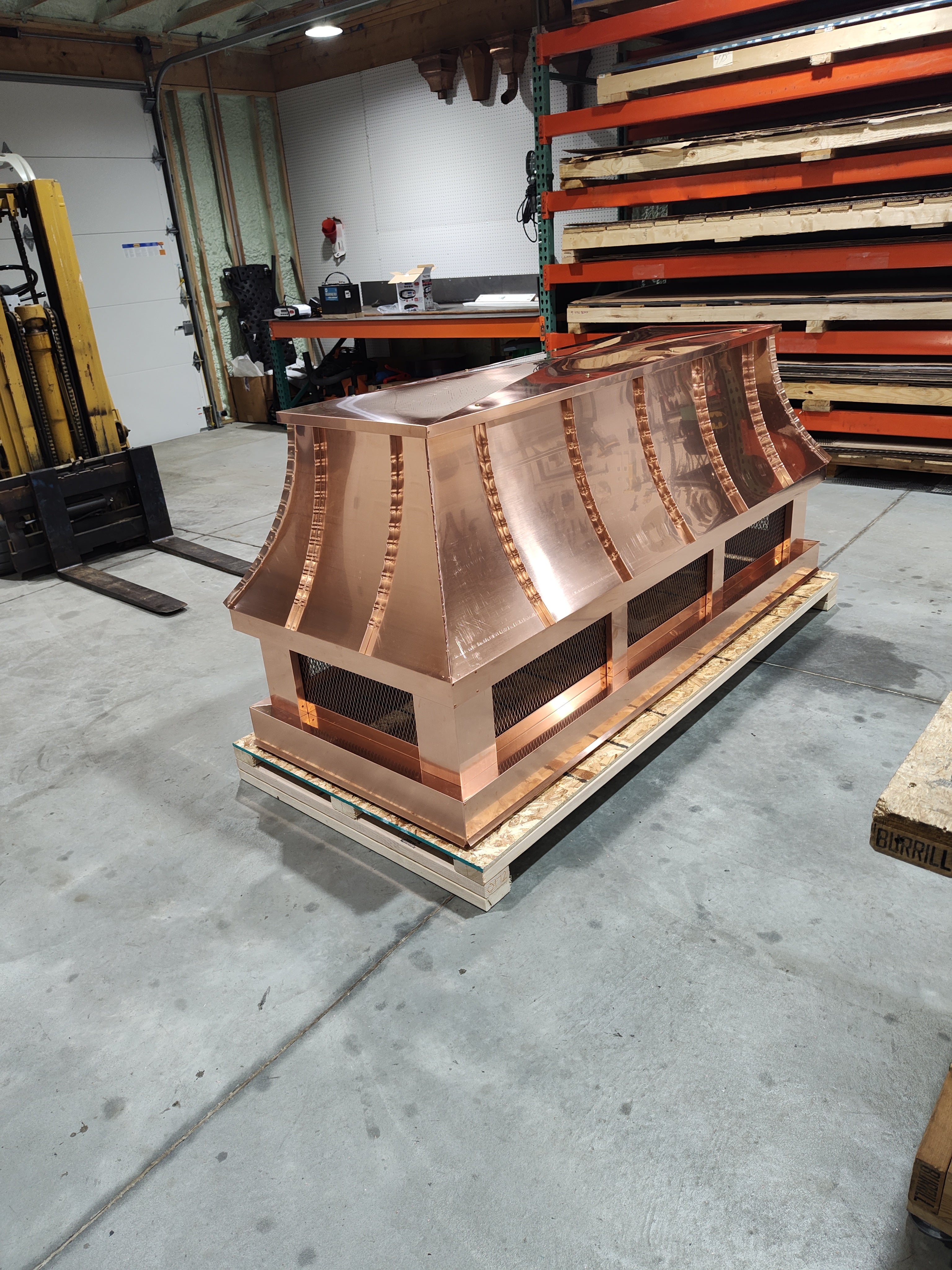 16oz copper chimney cap detail — hand-fabricated seams and riveted construction


