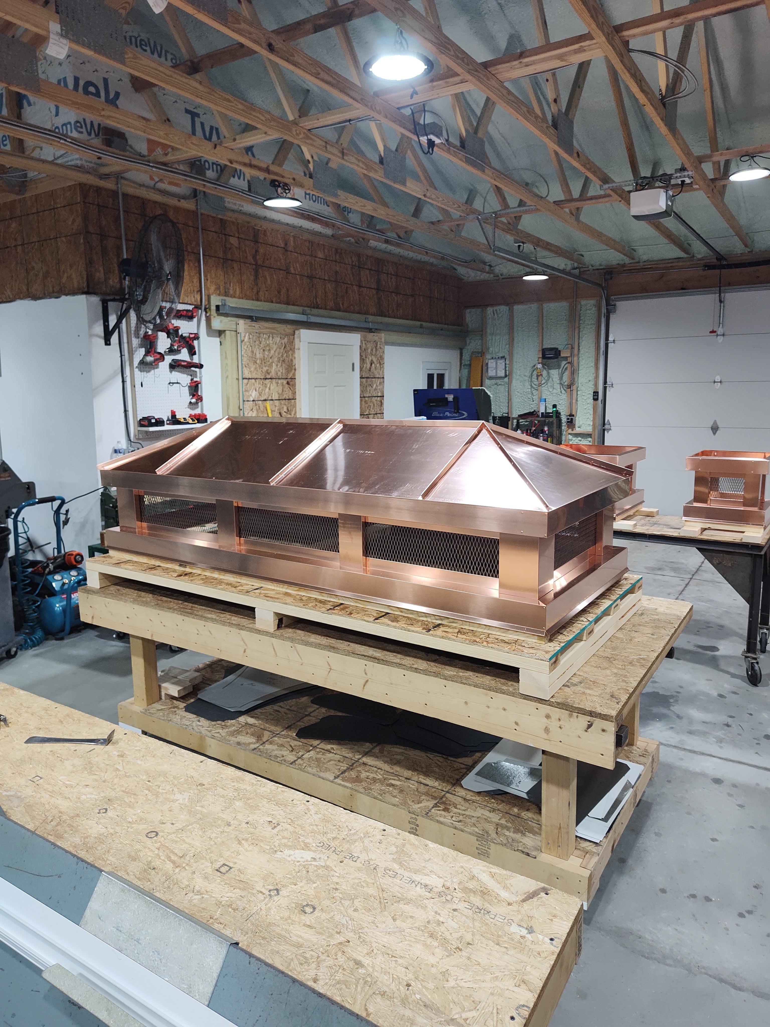 Custom copper hip roof chimney cap design by Archaic Metal — handcrafted in NJ


