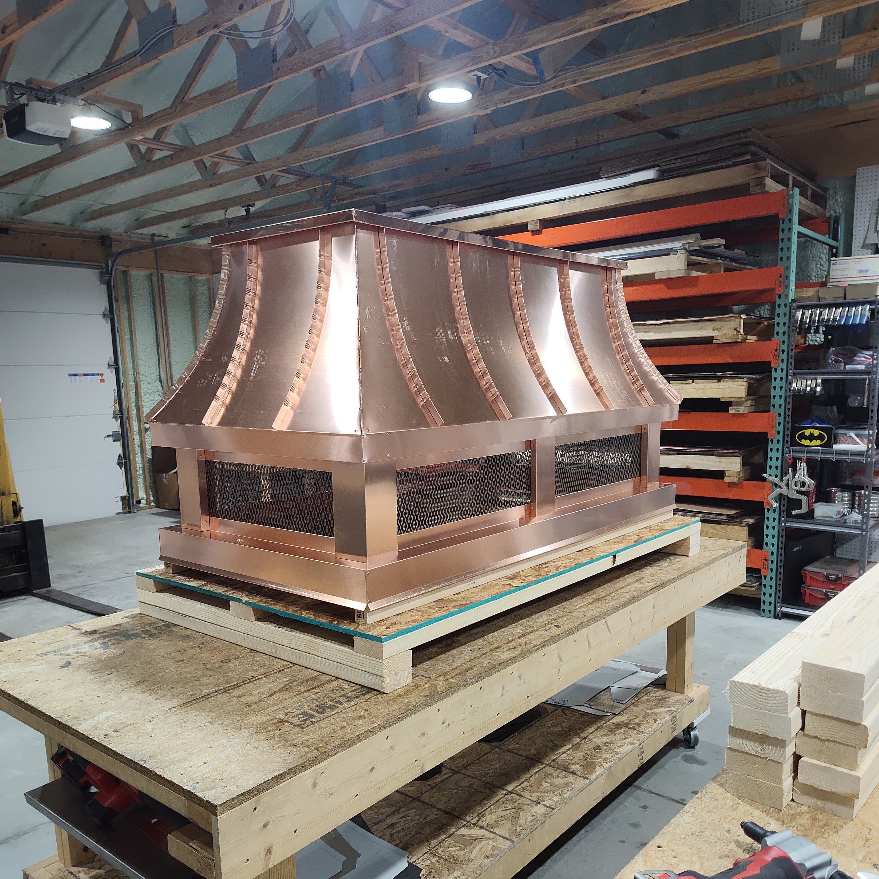 Custom copper chimney cap at 45 degree angle showing construction detail

