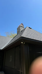 Custom copper chimney cap on residential stone chimney, Connecticut property