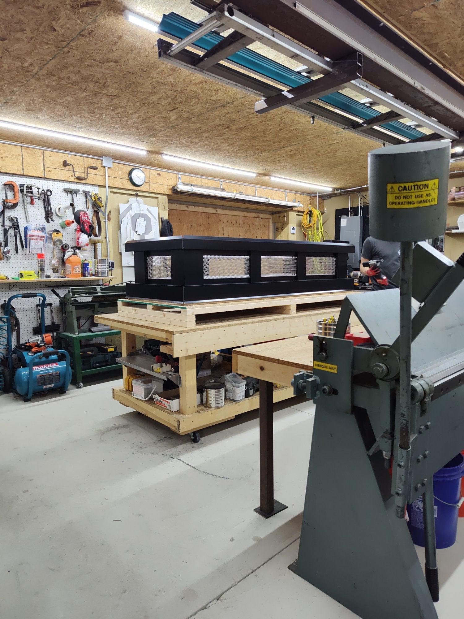 Custom black Kynar aluminum straight panel chimney cap shop front view — hand-fabricated by Archaic Metal Berlin NJ