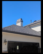 Custom black Kynar aluminum straight panel chimney cap installed on residential home full view — hand-fabricated by Archaic Metal Berlin NJ