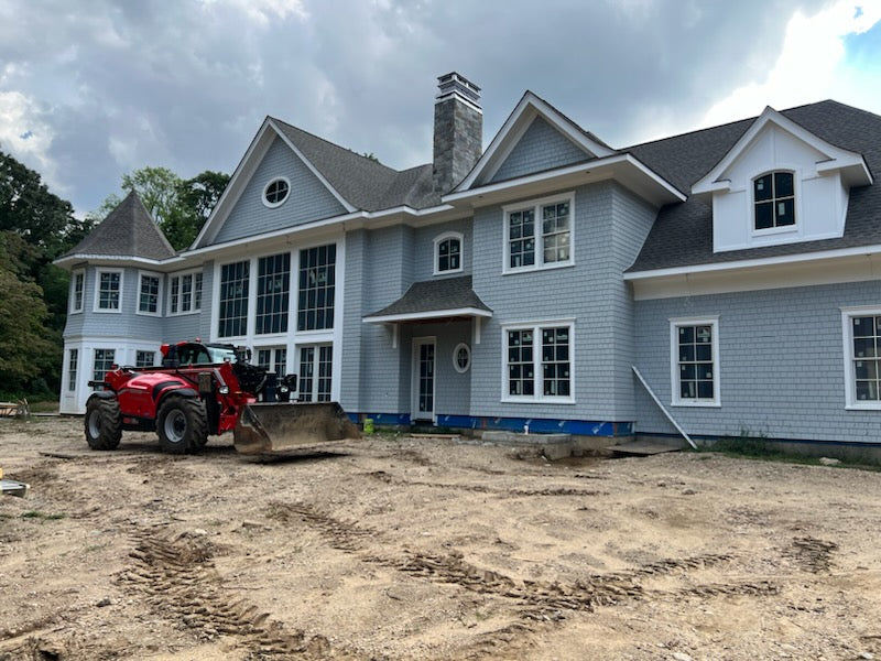 Lead-coated copper crown top chimney cap installed on large shingle-style new construction home — hand-fabricated by Archaic Metal