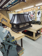 Midnight bronze Kynar aluminum chimney cap with spark screen — custom fabricated in the Archaic Metal shop, Berlin NJ