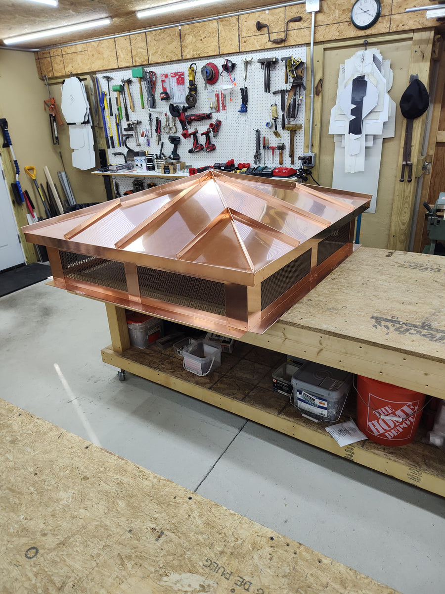 Top mount copper hip and ridge chimney cap — custom fabricated to exact dimensions

