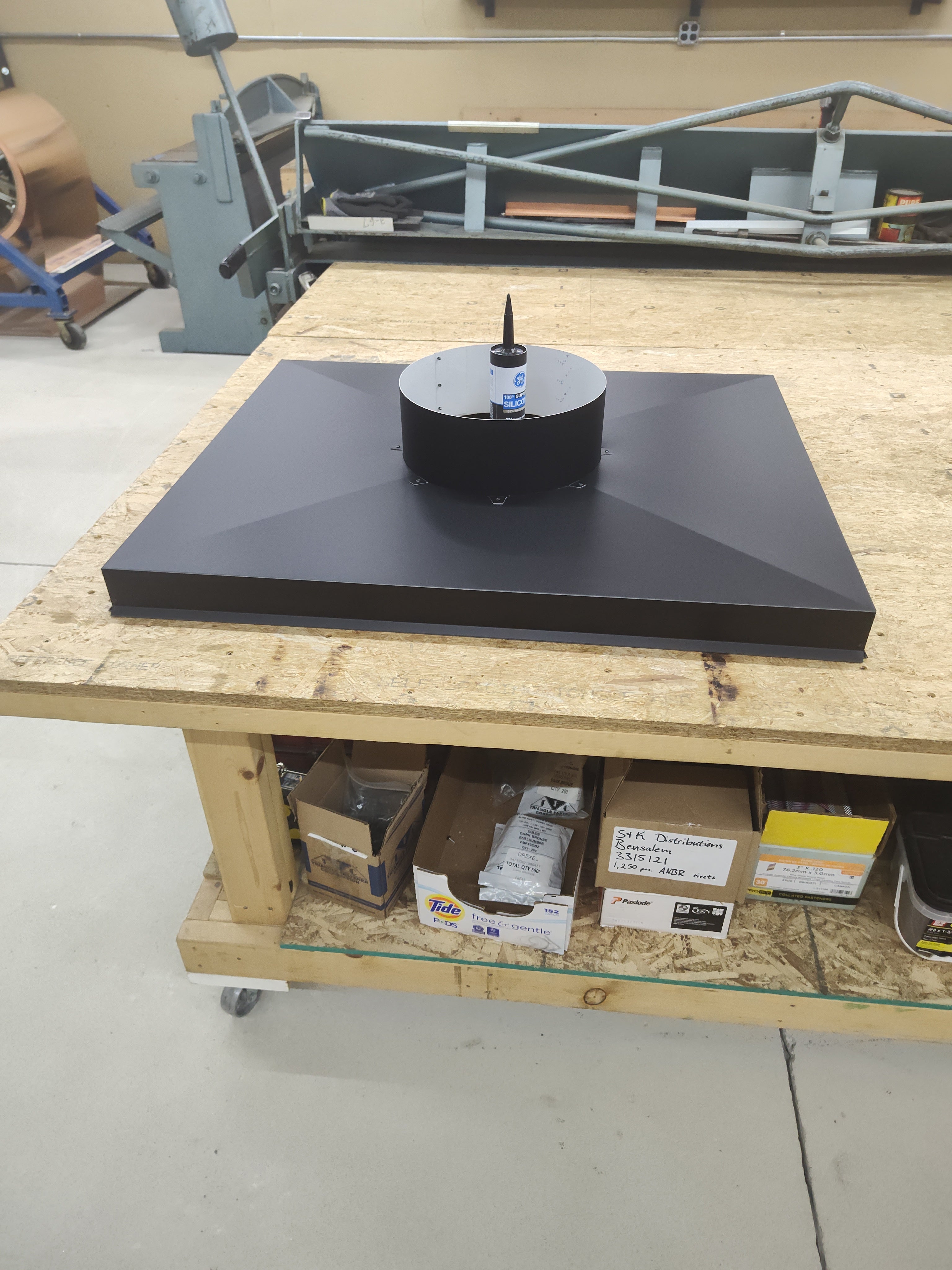 Custom stainless steel chimney chase cover during fabrication at Archaic Metal shop in New Jersey